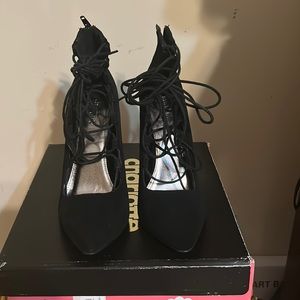 Black tie up high heels size eight worn a few times
